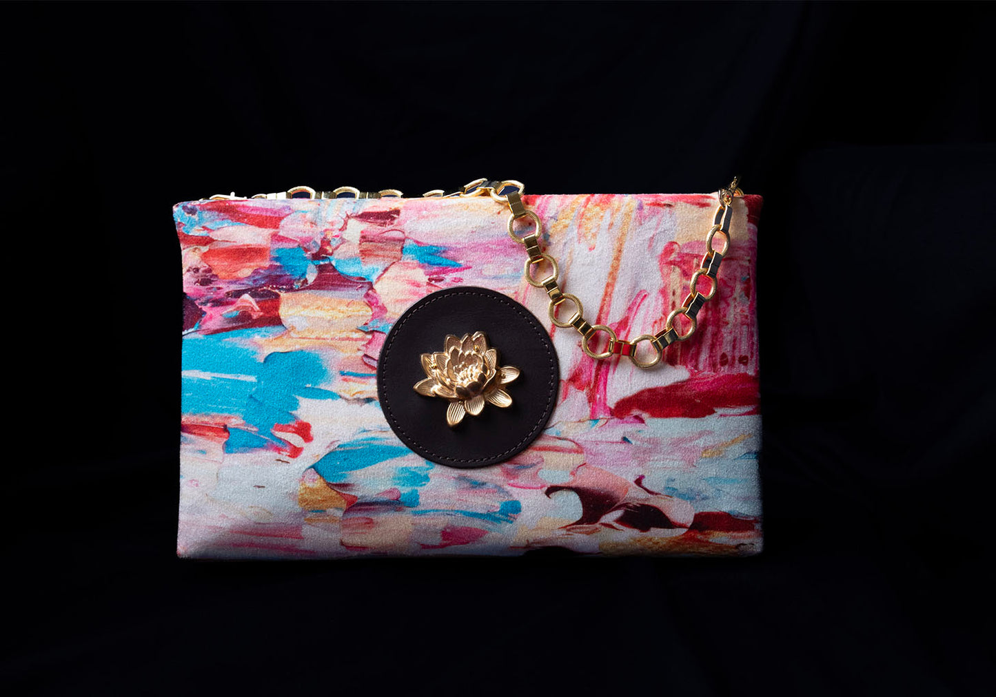 Colorful clutch bag with lotus brass accent on brass chain